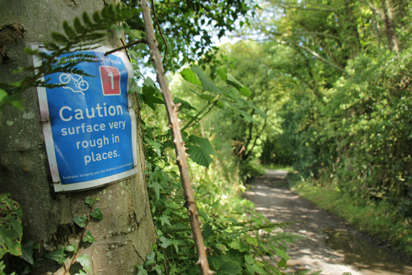 'Caution surface very rough' sign, Cinder Track
