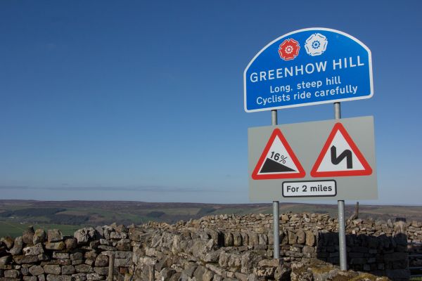Sign cautioning care on the descent of Greenhow Hill