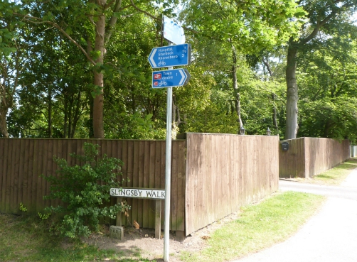 Signs at junction of Slingsby Walk and Oatlands Drive