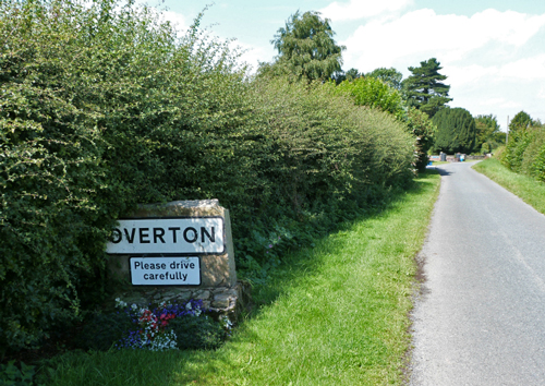 Sign at the entrance to the village of Overton